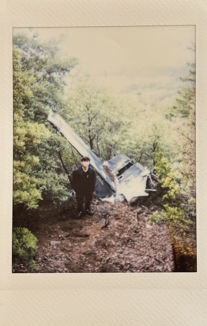 Polaroid of me next to tail section